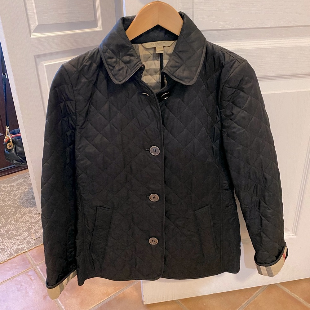 Burberry Brit quilted jacket with classic burberry print inside. Size small.